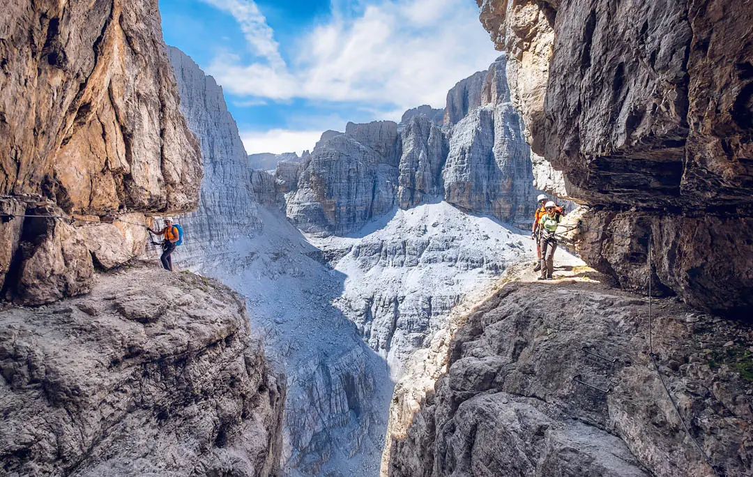 Several tourists on the Bocchette Centrali (a part of Via delle Bocchette) via ferrata in the Brenta Dolomites